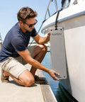 Man installing Boat Dock Protector Cushion EVA Foam To Prevent Collisions And Hull Damage on yacht with easy tie rope