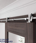 Top Mount Sliding Barn Door Hardware Kit In Stainless Steel, 6 Feet Track installed on wooden door frame, T Shape Hanger System.