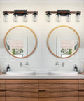 4 Light Farmhouse Vanity Light Fixture with Antique Wood Style Pole and Clear Glass Shades Over Mirror in Bathroom