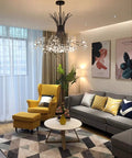 Modern Firework Crystal Dandelion Chandelier Pendant Lighting in living room with yellow chair and grey sofa, black ceiling fixture