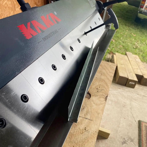 Built Tough 48 Inch Box And Pan Sheet Metal Brake Handling 16 Gauge Mild Steel with visible forming area and adjustment features.