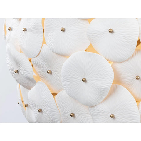 Contemporary Coastal 9 Light Pendant Featuring Legacy Brass Finish And Clean White Ceramic Shades detailed view of floral ceramic shades