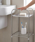 Metal Storage Rack On Wheels, Floor Standing Movable Shelving Unit with soap and toothbrushes for bathroom organization
