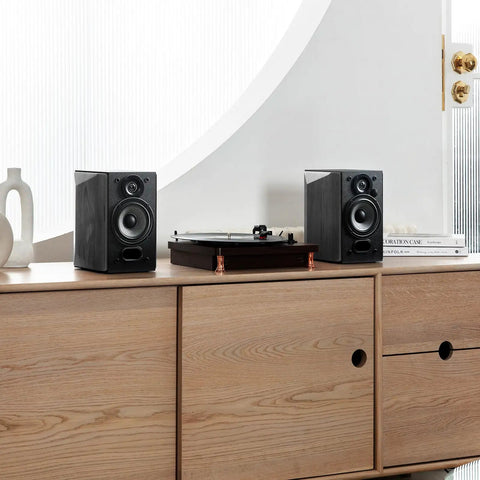 R1380DB Active Bluetooth Bookshelf Speakers With Optical And Coaxial Inputs 2.0 Wireless Studio Monitor on wooden shelf