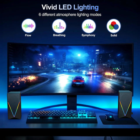 Desktop Computer Speakers With 6 Colorful RGB Lights USB Powered HiFi Stereo 2 Channel Enhanced Bass And Volume Control 3 5mm Aux Headphone Jack For Laptop Monitor PC Tablet And Phone next to gaming monitor with vivid LED lighting.