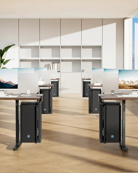 Office with multiple under-desk PC mounts, each holding a computer tower in a workspace setting, showing neat organization.