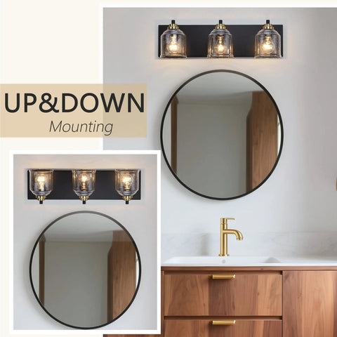 24 Inch Vanity Light With Black And Gold Finish, Three Light Over Mirror Bathroom Fixture With Clear Glass Shade, Mounted Above a Round Mirror