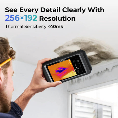 Game-Changing Thermal Imaging Camera With 256x192 IR Resolution being used on a wall, 5 inch touchscreen displaying heat map.