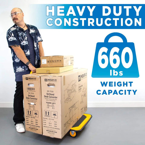 Heavy Duty Folding Hand Truck Dolly Featuring A Rock Solid 660 Pound Weight Capacity And Easy Glide 360 Swivel Casters Foldable Flatbed Cart with boxes in use.