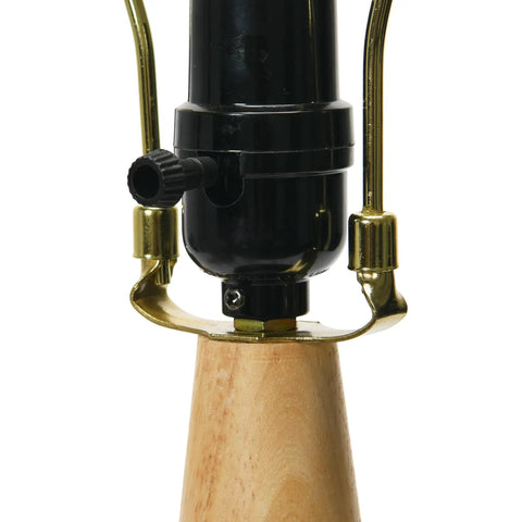 Natural Wood And Black Ceramic Table Lamp base close-up, showing rotary switch and natural wood texture
