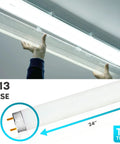 Hands installing 30 Pack F17T8 Fluorescent Tube Light Bulbs 24 Inch 17W 5000K Bright White, 1350 Lumens, G13 Medium Bi Pin Base in ceiling fixture.