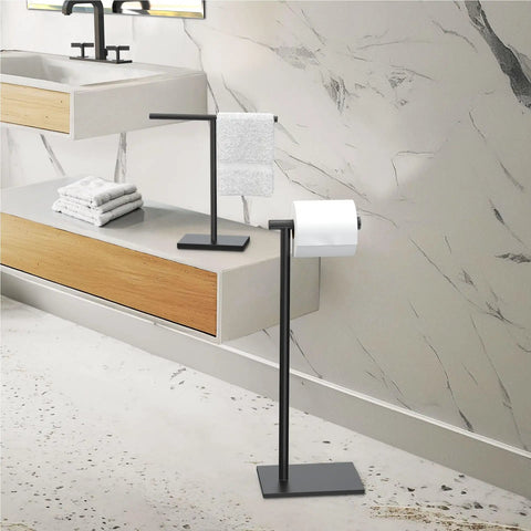 Modern Square Base Toilet Paper Holder Stand In Matte Black No Drill Install Free Weighted And Padded Base For Stable Rust Resistant Metal Bathroom Accessory 22.25 Inch Tall in a bathroom setting