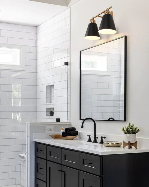 Black and Gold 3 Light Vanity Light for Bathroom Over Mirror 23 Inch Sleek Modern Farmhouse Wall Sconce with Metal Shade installed above mirror