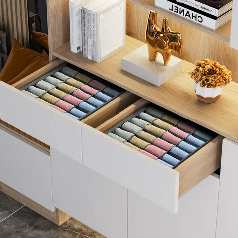 Two Pack Grey Sock Drawer Organizer Features Twenty Four Spacious Cells To Keep Your Drawers Crisp By Knocking Down Daily Clutter And Neatly Parking Underwear Ties Belts in a drawer with color-coordinated socks.