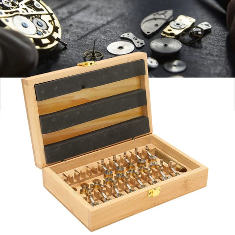 Pro Grade Mainspring Winder Tool Kit With Copper Construction in wooden box shown open, watch parts in background