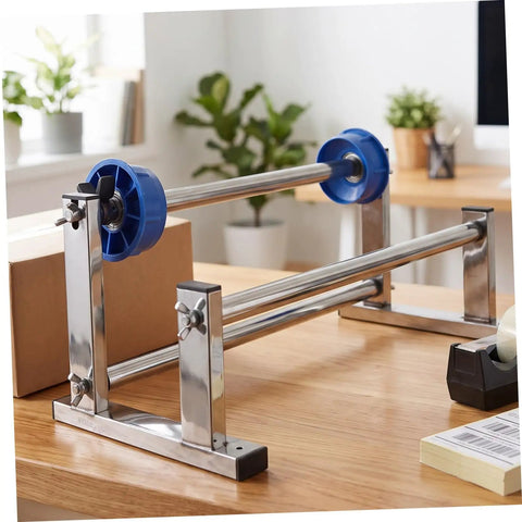Manual Stretch Film Dispenser Stand For Shipping Supplies Hand Operated Wrap Film Holder With Metal And Plastic Construction Lightweight Yet Sturdy For Easy Desktop Wrapping And Efficient Warehouse Or Home Packing on desk