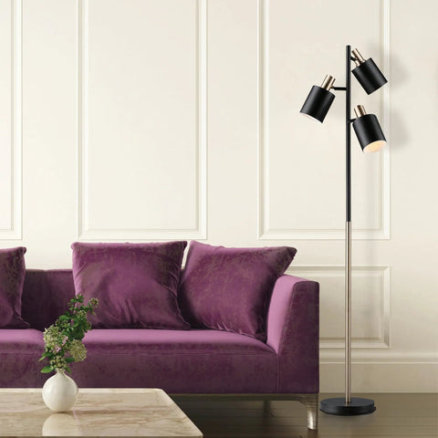 Annecy 58 Inch Rustic Floor Lamp With 3 Lights, Dark Bronze Finish, beside a purple sofa in a modern living room.