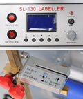 Control panel of Top Notch Semi Automatic Round Bottle Labeling Machine With A Slick Label Applicator And 110V Wall Plug Power.