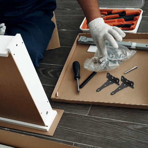 Heavy Duty T Shaped Barn Door Hinges For Shed And Gate Hardware Five Inch Solid Iron Frame on a work surface with tools.