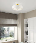 Meridian Collection 3 Light Satin Brass Semi Flush Mount Ceiling Light With Off White Hardback Fabric Shade in a modern room