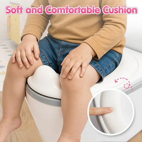 Toddler using soft and comfortable cushion on Tot Sized Three In One Potty Training Toilet with removable seat.