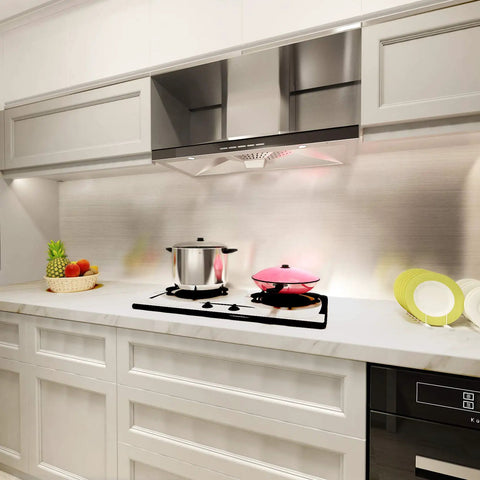 Modern kitchen featuring cabinets with removable peel and stick silver stainless steel look contact paper for metal surfaces.