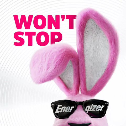 Cute pink rabbit wearing sunglasses promotes batteries with the slogan "Won't Stop" for long-lasting energy.