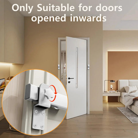 Tough As Nails 38 Inch Stainless Steel Interior Door Security Bar installed on inward-opening door with rubber brackets.