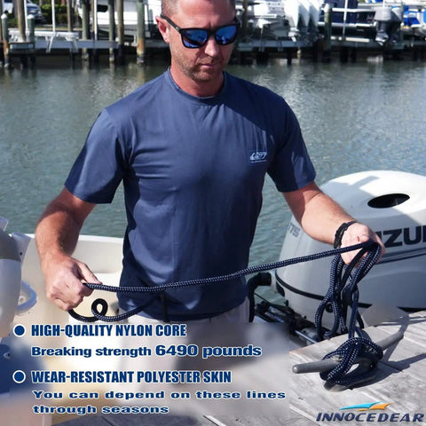 Man handling Rock Solid 1/2 Inch X 15 Feet Dock Lines Navy Blue 4 Pack Marine Grade Double Braided Nylon Boat Rope on dock.