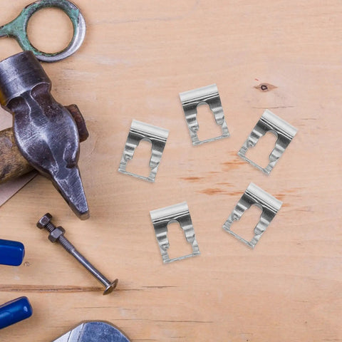 Universal Auto Windshield Wiper Linkage Repair Clips Kit Built Tough With Heavy Duty Stainless Steel for Cars Trucks and SUVs on wood background.
