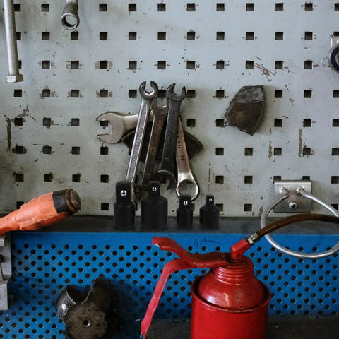 Premium Black Socket Converter Adapter Set Includes 4 Durable Tool Steel Pieces For Wrenches With Heavy Duty Impact Grade Build And Strong Torque Capacity Perfect For Any Serious Auto Repair Or Home Mechanics Job You Need To Get Done on tool pegboard