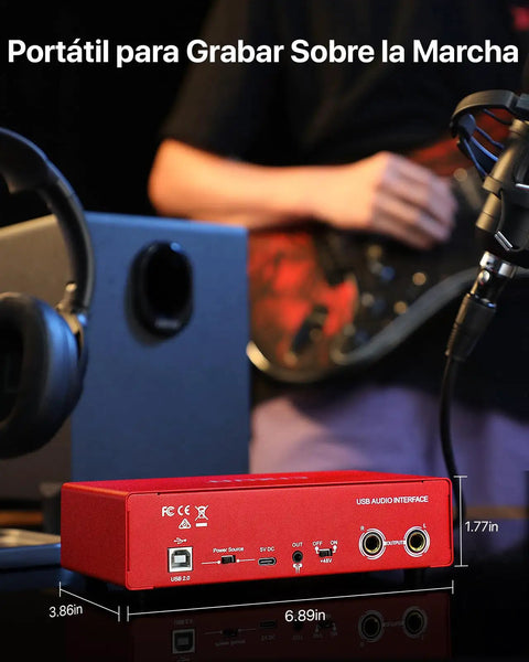 2x2 USB C Audio Interface For PC And Mac with matte red metal shell, dual inputs, and 48V phantom power on a studio desk.
