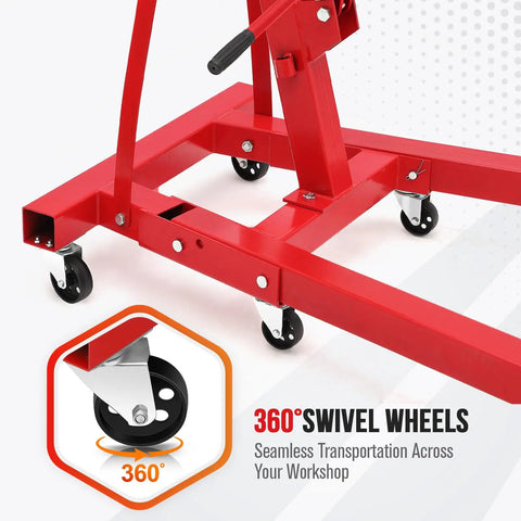 Close-up of two ton folding hydraulic engine hoist with telescopic boom, showing red base and six swivel casters.