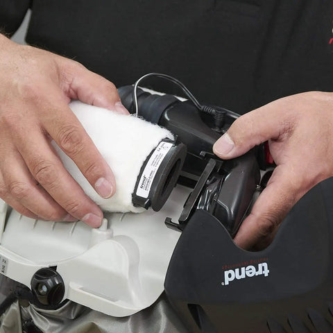 Close-up of Airshield Pro Respirator and Face Shield Bundle With Extra Battery Charging Cradle and Eight Hour Rechargeable Battery.