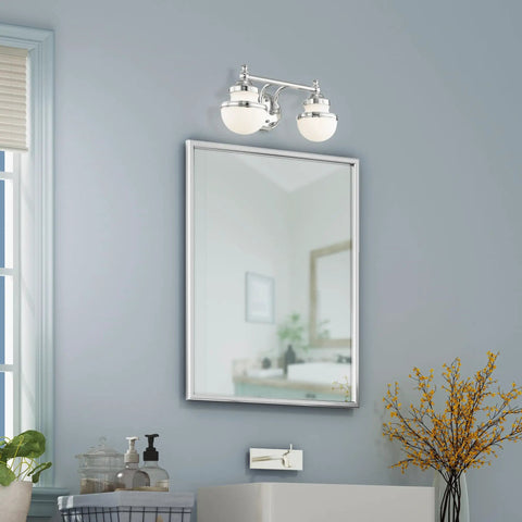 Transitional Two Light Bath Vanity Fixture From Oldwick Collection in Polished Chrome Finish installed above mirror, 15x7.25x8.25 inches