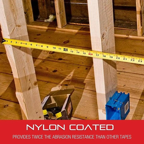 Retractable Metric Pocket Tape Measure with Nylon Coating extended across wooden beams in construction site