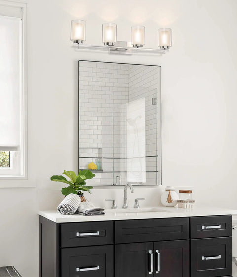 Lit 4 Light Vanity Light With Dual Glass Shades In Brushed Nickel Hardwired Wall Mount Indoor Modern Bath And Kitchen Fixture For Bathrooms Hallways And More above a bathroom mirror.