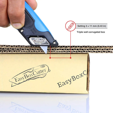 Heavy Duty Box Cutter With Three Adjustable Blade Depths And Precision Edge Guide cutting through triple wall corrugated box.