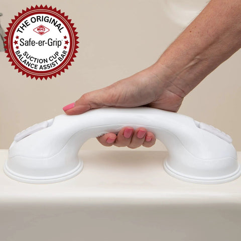 Hand holding No Tools Needed Suction Cup Bath Grab Bar For Bathtub And Shower Walls Safe Portable Bathroom Assist Handle White 12 Inch
