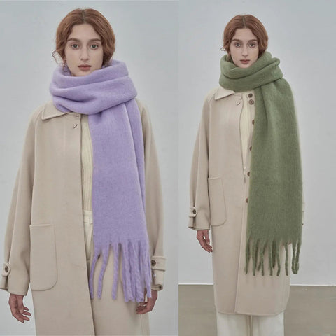 Woman wearing Cozy Large Blanket Wrap Shawl For Women, Soft Thick Knit Scarf Neck Warmer, All Season Throw in lavender and green.