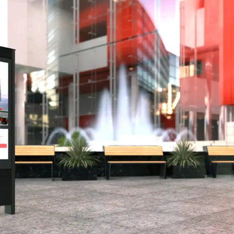 Heavy Duty 55 Inch Outdoor Portrait Kiosk Weatherproof Digital Signage Enclosure displayed near a fountain in an urban setting.