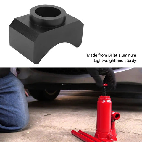 Beefy Billet Aluminum Axle Saddle Lifting Adapter for Hydraulic Jacks Universal Fit displayed with bottle jack