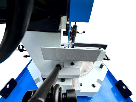 Knockout Shop Beast 4 HP 16 Inch Cold Cut Saw rig showing adjustable spinner vise for metal cutting setup.