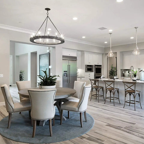 Bright kitchen dining area with pendant lights, showing potential use for 6W Dimmable LED Tubular Bulb 60W Equivalent Daylight 4000K.