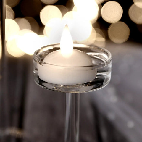 12 Pack Waterproof Floating Tea Light Candles Battery Operated Flameless Submersible LED Lights For Centerpieces Wedding Party Decor Warm White Glow That Epic Vibe in clear holder with warm lighting in background