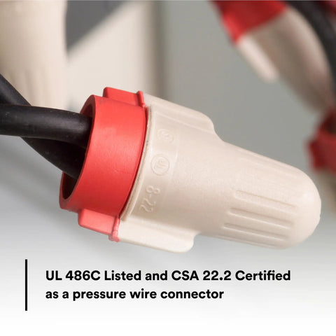 Solid As A Rock Tan And Red Wire Connectors For Twenty Two To Eight Gauge Cables Flex Springs close-up on pressure wire connector.