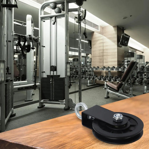 88mm Cable Pulley Wheel For Home Gym System Hard Nylon Lifting Wheel With Smooth Bearing Design displayed on a table