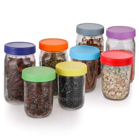 Hella Versatile Wide Mouth Mason Jar Lids 16 Pack Dope Colored Plastic Caps For Ball And Kerr Canning Jars Featuring Legit Leak Proof Food Grade Storage Covers That Make Your Pantry Pop, jars filled with various foods, colorful lids, wide mouth design.