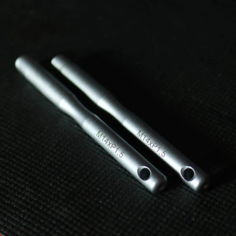 Two Wheel Hanger Pin Set M14 x P1.5 on black surface showing alignment and rotor protection use