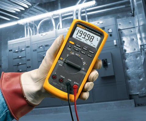 Technician using Beefed Up Pro Grade Industrial Digital Multimeter For Troubleshooting With 1000 Volt AC DC Range, Peak Min Max.